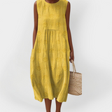 Elegante vestito estivo in cotone senza maniche con tasche