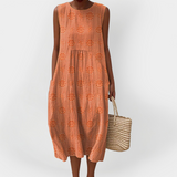 Elegante vestito estivo in cotone senza maniche con tasche