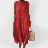 Elegante vestito estivo in cotone senza maniche con tasche