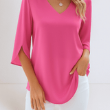 Top elegante con scollo a V e maniche aperte